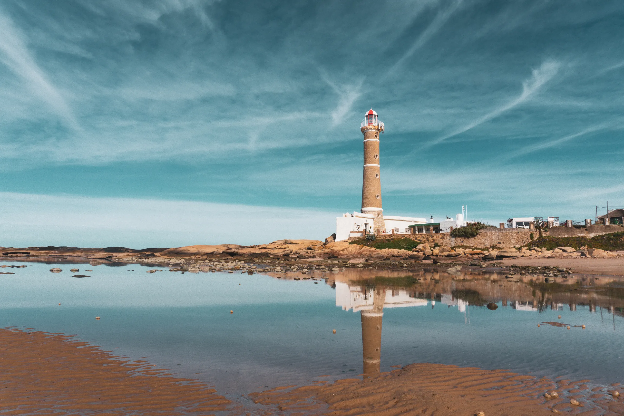 The José Ignacio lighthouse mirrored in the low tide
